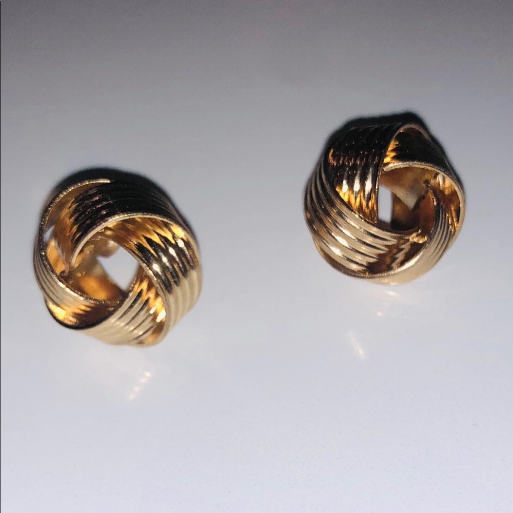 Costume XL knot earrings w/ ribbing in gold tone